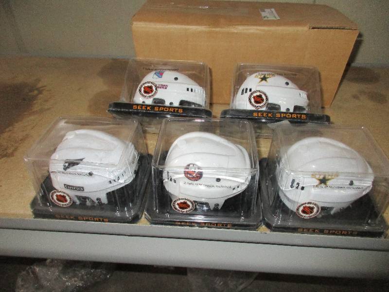 lot 142 image: 5 - mini NHL helmets