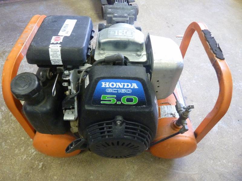 lot 549 image: Coleman Powermate Compressor