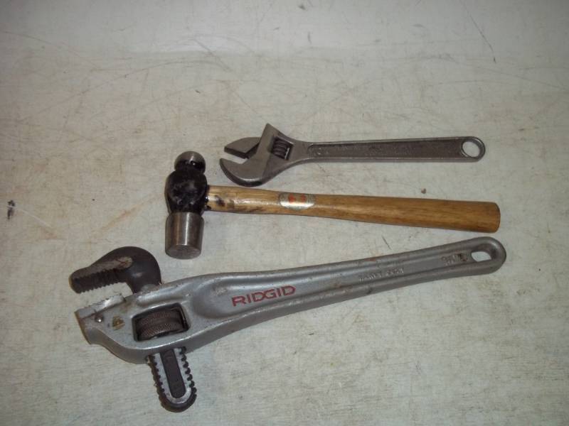 lot 141 image: Pipe Wrench, Hammer and adjustable wrench