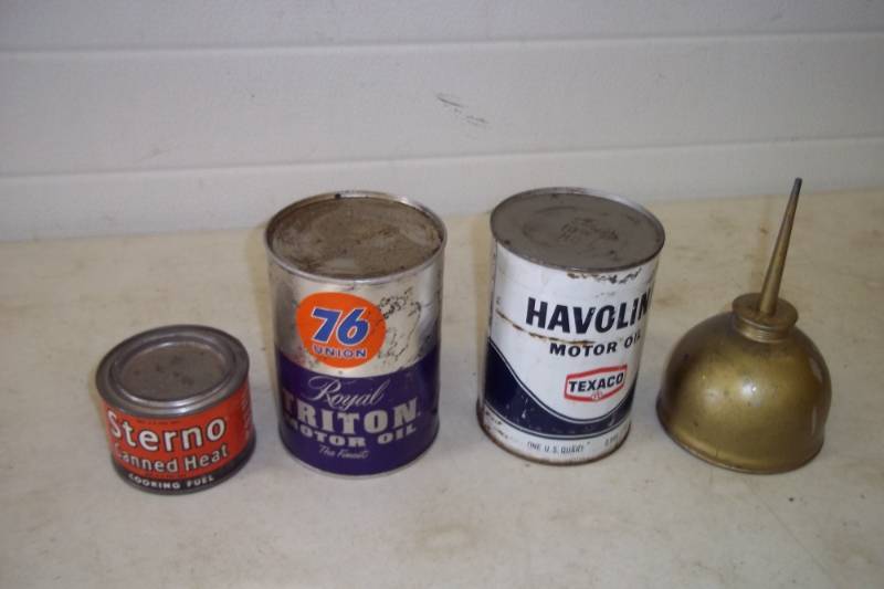lot 77 image: Vintage oil cans (two are full)