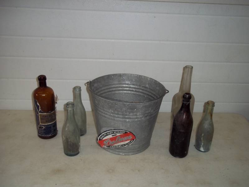 lot 94 image: Antique bottles in Pail