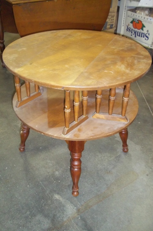 lot 100 image: Rotating book shelf table 28in diameter 26in tall