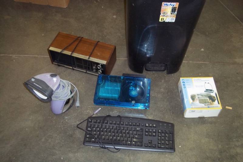 lot 207 image: Misc lot  includes garbage can, key board, play station, steamer, listening system, vintage radio
