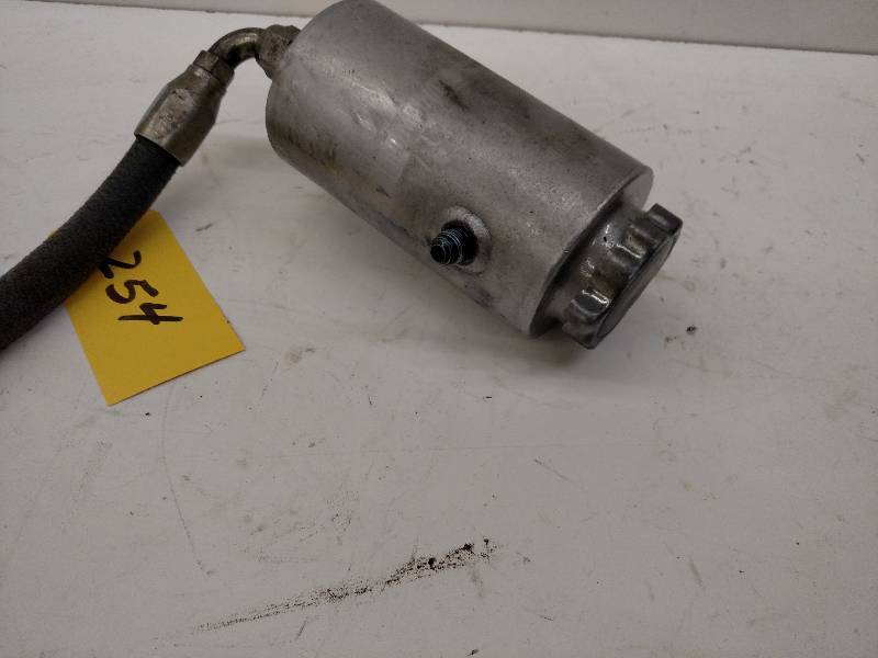 lot 254 image: Power Steering Tank & Hose...