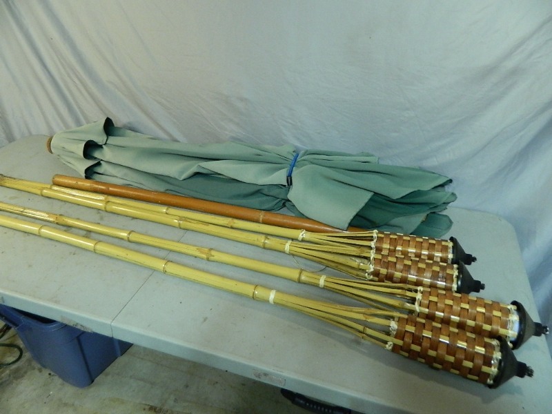 Umbrella and Tiki Torches