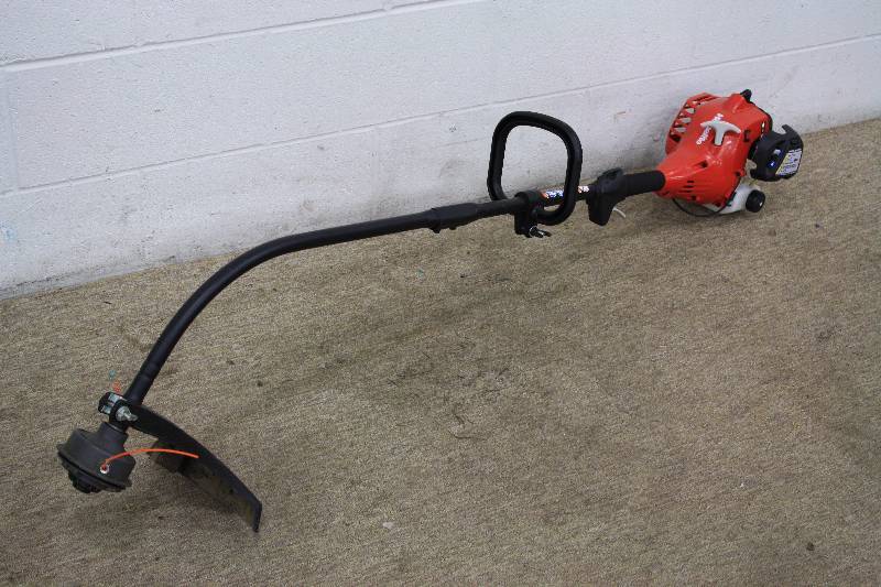 lot 25 image: Homelite Gas 2 Cycle Weed Whip