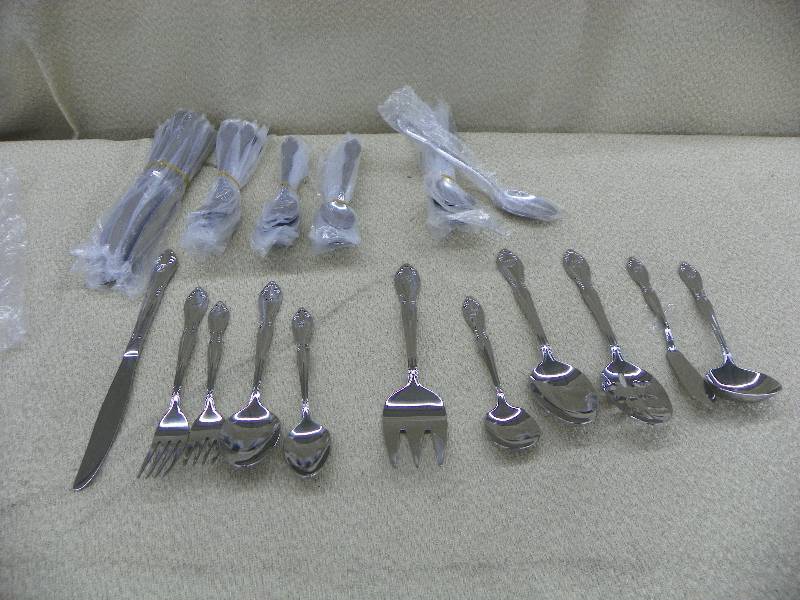 lot 288 image: Silverware Set with serving set, Initial D stamped on them