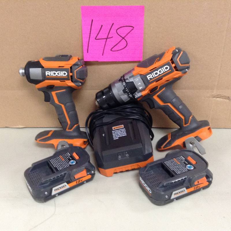 lot 148 image: Ridgid R9624 18v Lithium-ion Hammer Drilldriver& Impact Driver Kit Read
