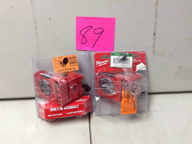 lot 89 image: Lot of 2 door instalation kits missing hole saws