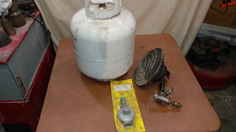lot 92 image: Sunflower Heater and Propane Tank