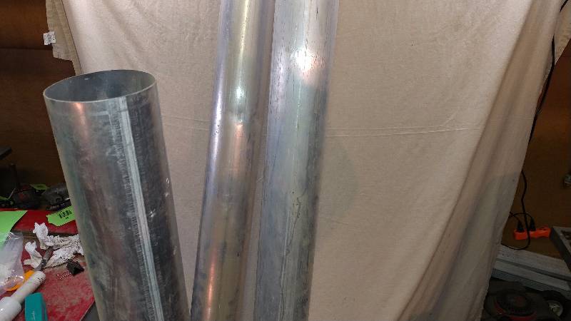 lot 158 image: Three Aluminum Pipes