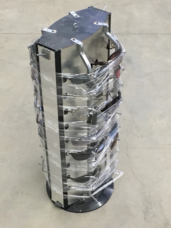lot 53 image: Sunglass Rack With Sunglasses