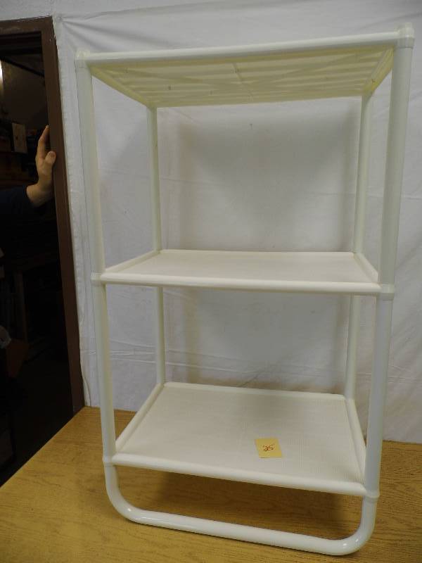lot 25 image: Shelf - Hamper - Backpacks - Folding Chair