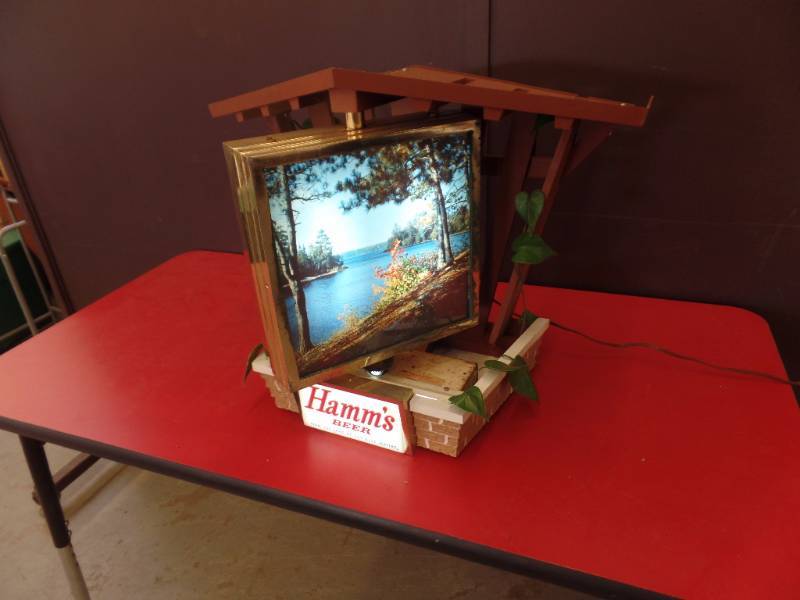 lot 206 image: Hamms Light Up Revolving Clock