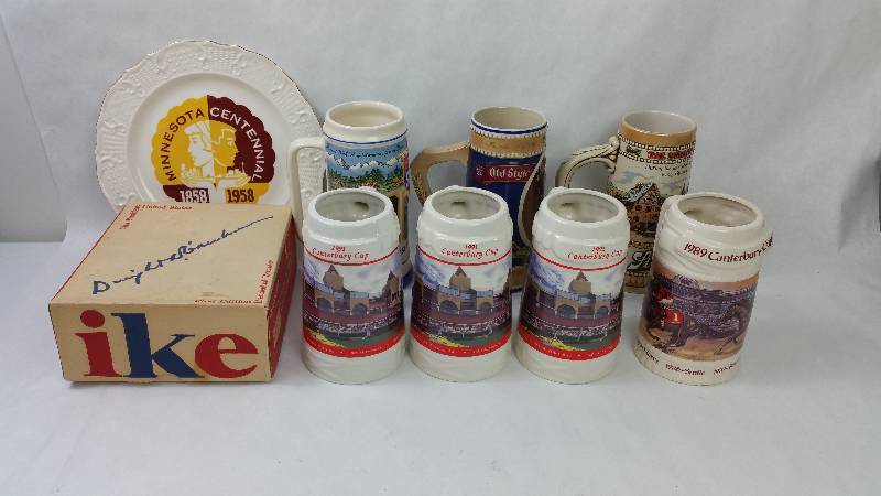 lot 55 image: 7 pc. Large Mug  Stein Collection, Minnesota Centennial & IKE Decanter