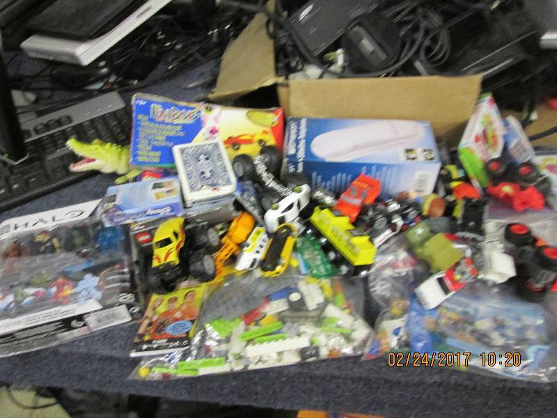lot of legos, matchbox cars and a p...