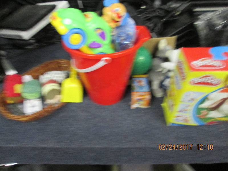 lot of toys and a play fireman suit...