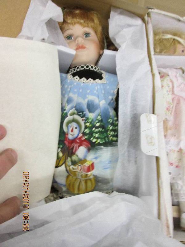 3 dolls all look new ...