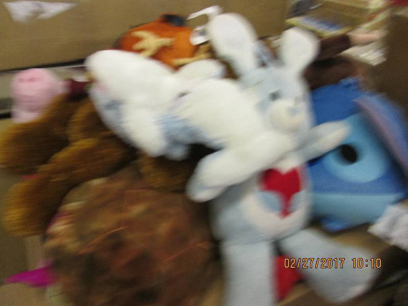 lot of stuffed animals most look ne...