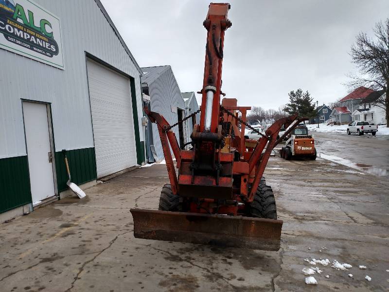 lot 12 image: Ditch Witch R65 Backhoe, Front Blad...