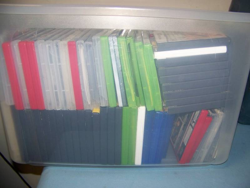 lot 66 image: (2 Large Bins) Miscellaneous EMPTY DVD and EMPTY Video Game (Playstation, XBox, Nintendo) Cases