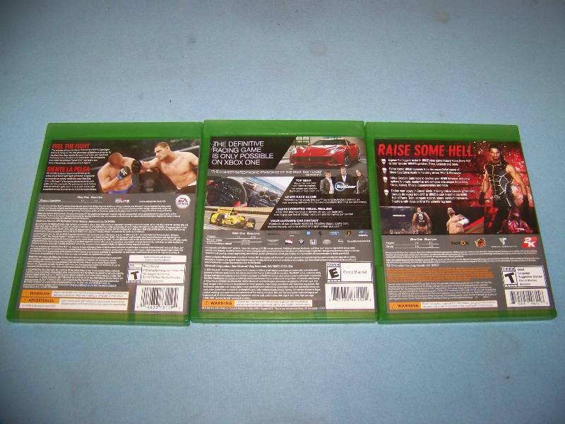 lot 27 image: (3) XBox One, Video Games