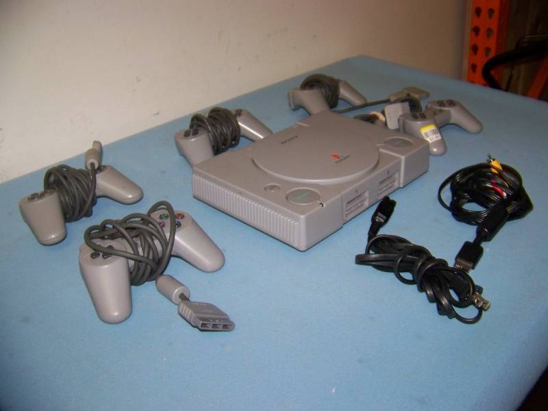 lot 39 image: Sony, Playstation, Video Game Console and Controllers
