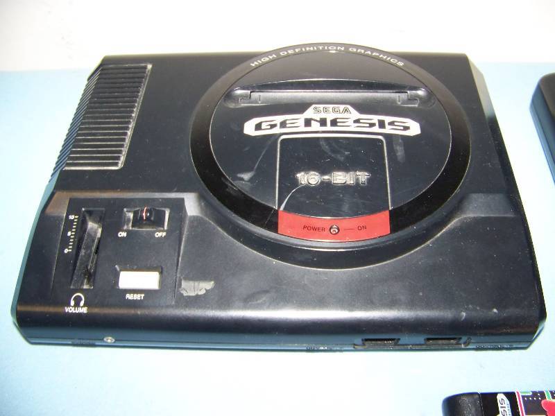 lot 42 image: (2) Sega, Genesis, Video Game Consoles and Controllers, (1) Sega, Game Gear, Portable Gaming Unit, (1) Nintendo, GameCube Console with Games and more