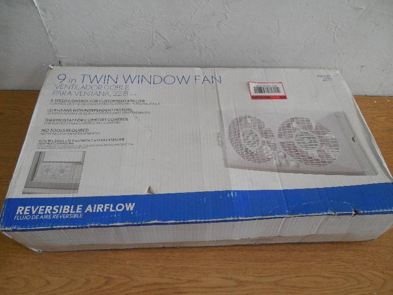 lot 50 image: 9 TWIN WINDOW FAN