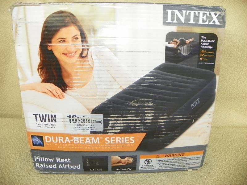lot 510 image: Pillow Rest Raised Airbed, MSRP $59.99