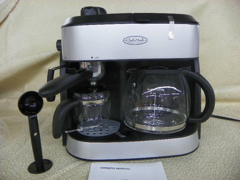 lot 522 image: Chefs Mark 4-in-1 coffee maker. Side of unit is cracked, but inside is not damaged and still works. MSRP $99.99