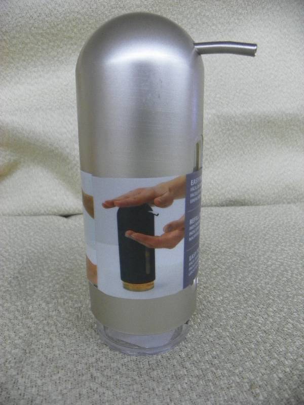 lot 537 image: Penguin Soap Dispenser Pump Satin Nickel, MSRP $21.99