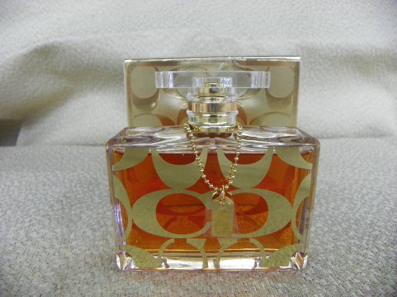 lot 540 image: Coach Signature Rose DOr Womens Cologne, MSRP $100.00