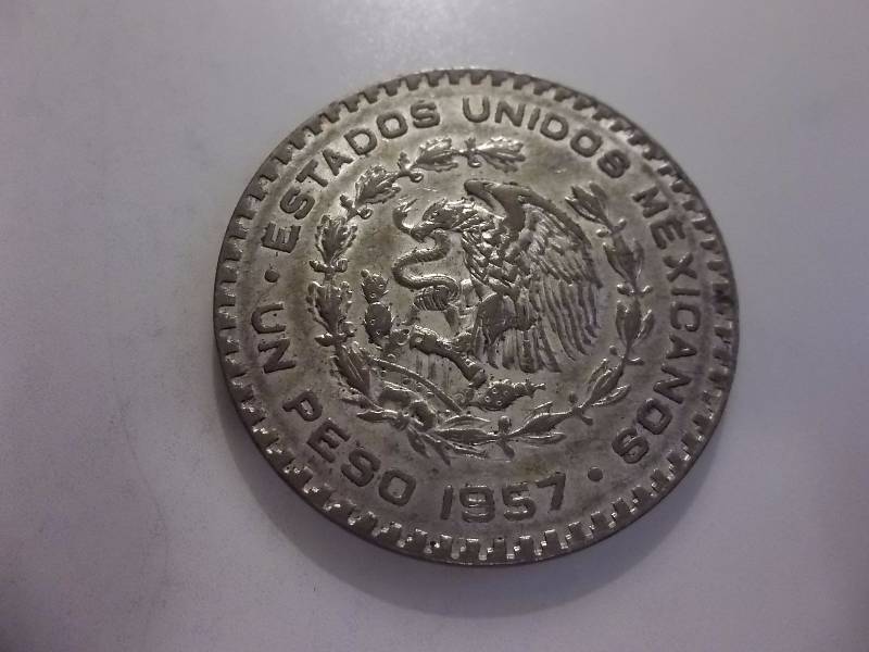 1957 Silver Mexican Peso .5104 Oz.