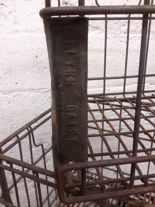 lot 60 image: 4Vintage milk Crates.. See closeups of the writing.