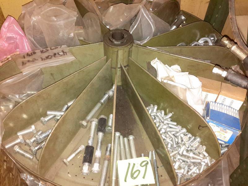 lot 169 image: 4 Shelf Carousel Shelf FILLED with nuts, bolts and other items