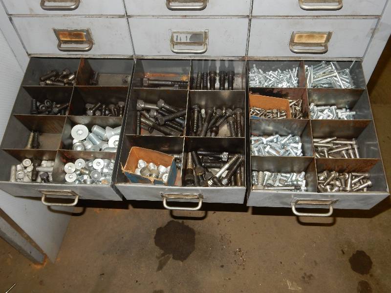 lot 184 image: 3 drawers of hardware.. take the hardware only.. Drawer not included