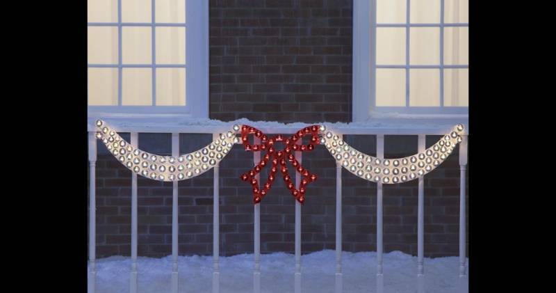 Dazzling Lighted Swag & Bow open bo...