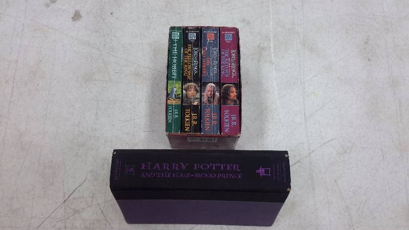 lot 22 image: Lord of the Rings book set and Harry Potter novel