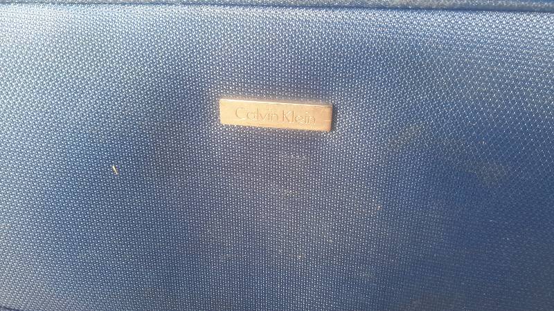 lot 74 image: Pair of rolling lrg luggage bags- Calvin Klein and Delsey brands