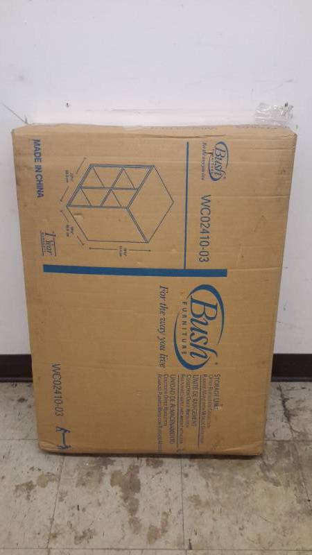 lot 77 image: New in the box storage cabinet