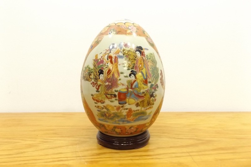 lot 19 image: Large 12 Asian Themed Porcelain Egg on Stand