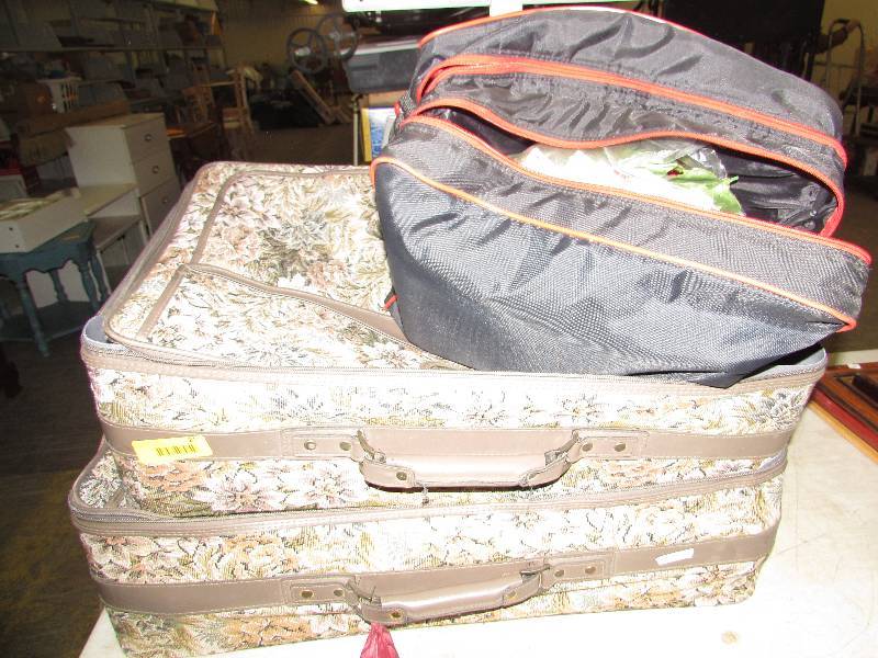 lot 21 image: Suitcases and craft items