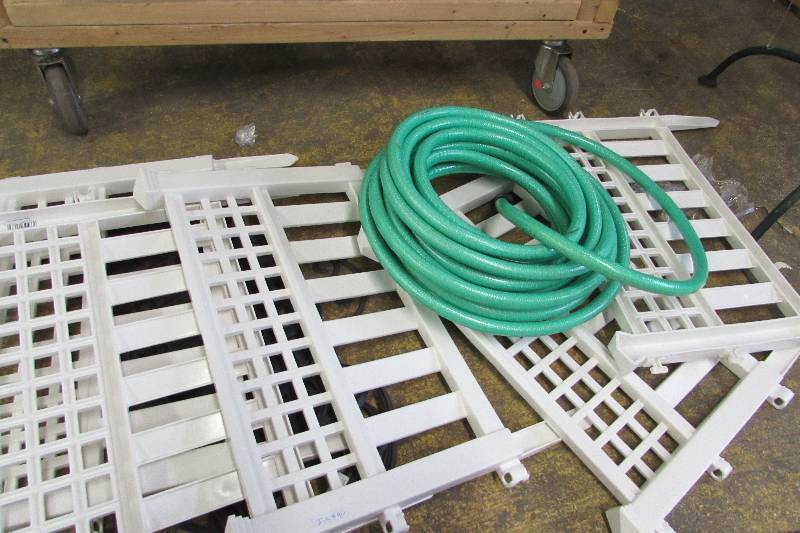 lot 35 image: Garden hose and small fences