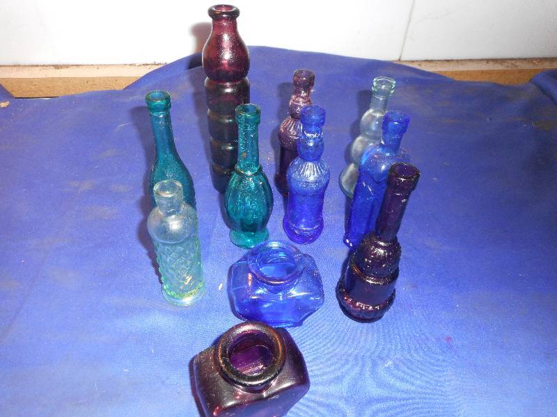 11 VINTAGE BOTTLES