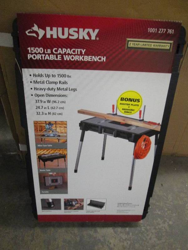 lot 39 image: husky 1500lb capacitiy foldable wor...