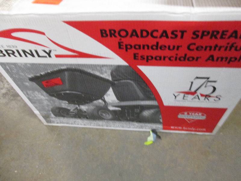 lot 46 image: brinly broadcast spreader looks new...