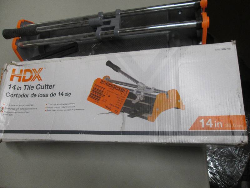lot 48 image: 14 tile cutter looks used ...