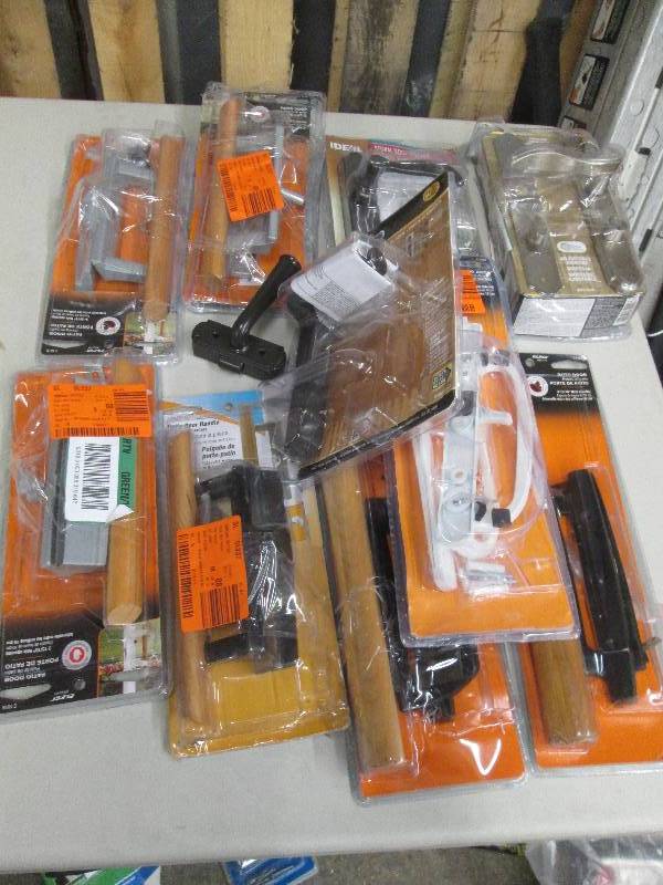 lot 137 image: 6 patio door handles and 4 storm do...