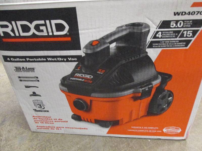 lot 190 image: ridgid 4 gallon portable vac open b...